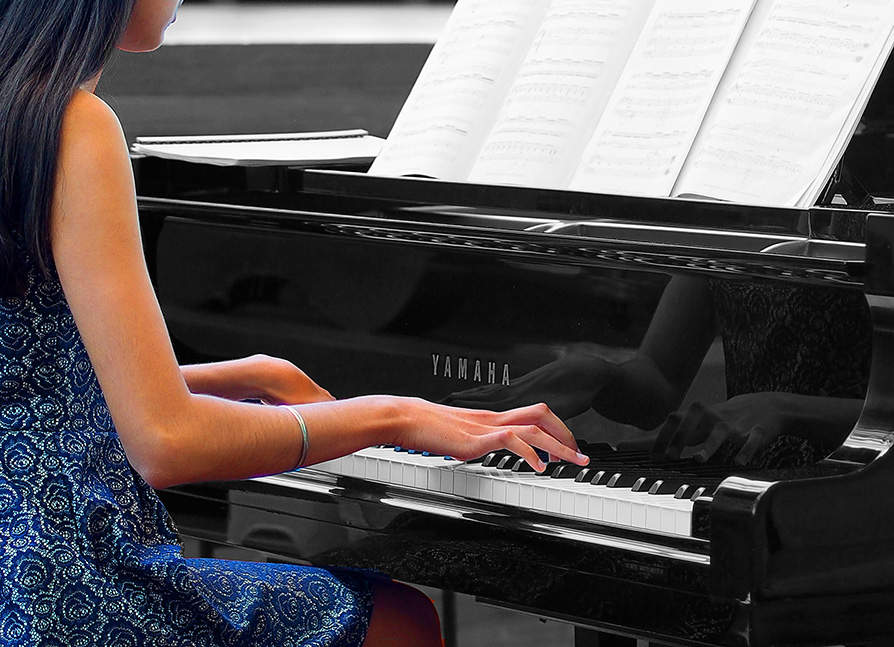 Photo of Pianist performing.